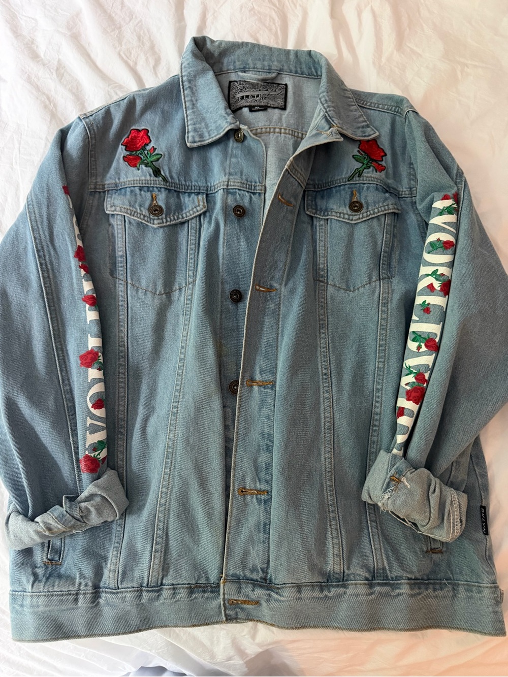 Vintage Light Blue Denim Jacket with Graphics